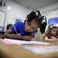 9-Year-Old-Girl-Born-Without-Hands-Wins-Best-Handwriting-Award-See-Photos.dailyfamily.ng_